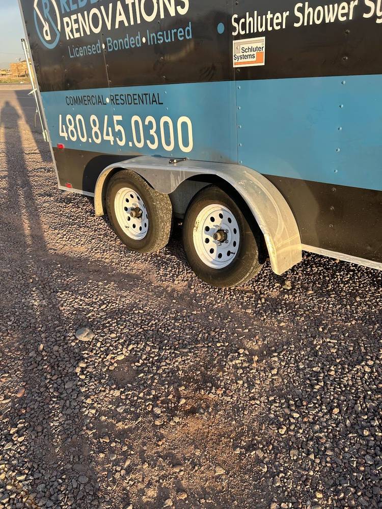 Enclosed trailer in for wheel and axle service